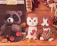 Raccoon Toilet Paper Holder, Betty Barn Owl, and Henry Horned Owl are featured in Annies Attic Harvest Home Decor.