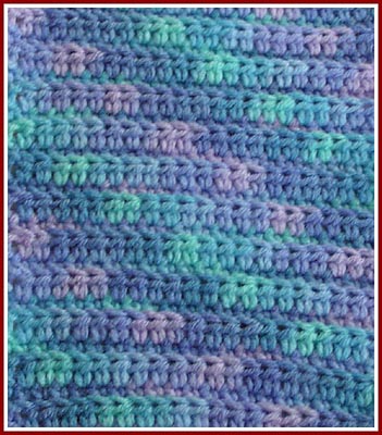 Afghan block sized for Warm Up America afghan project.